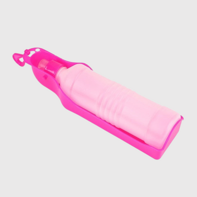 https://cdn.shopify.com/s/files/1/0763/9767/4819/files/Biberon_distributeur_d_eau_pour_chien_rose.png?v=1766076249