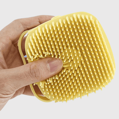 https://cdn.shopify.com/s/files/1/0763/9767/4819/files/Brosse_de_bain_pour_chien_carre_canin.png?v=1746199314