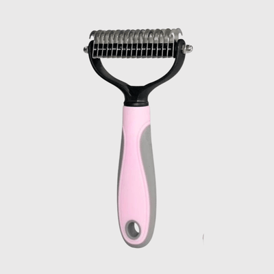 https://cdn.shopify.com/s/files/1/0763/9767/4819/files/Brosse_pour_chien_poil_long_rose_clair.png?v=1748612843
