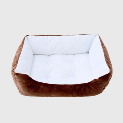 https://cdn.shopify.com/s/files/1/0763/9767/4819/files/Canape_lit_pour_chien__marron-blanc.png?v=1744811842
