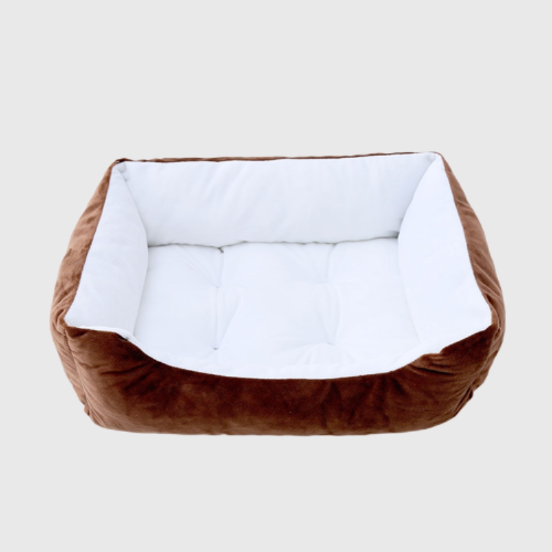 https://cdn.shopify.com/s/files/1/0763/9767/4819/files/Canape_lit_pour_chien_marron_blanc_avec_chien_de_chasse_et_ses_maitres_derriere.png?v=1744811864