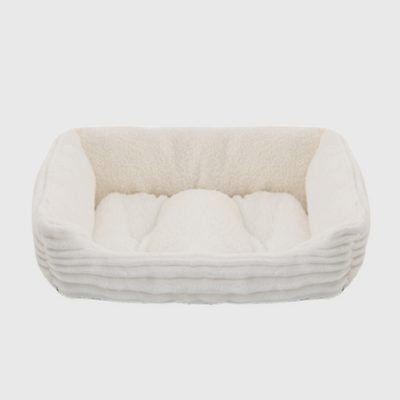 https://cdn.shopify.com/s/files/1/0763/9767/4819/files/Canape_lit_pour_chien_blanc.png?v=1744811842