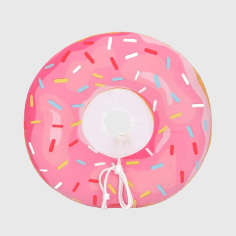 https://cdn.shopify.com/s/files/1/0763/9767/4819/files/Collerette_pour_chien_en_forme_de_donut_rose.png?v=1695912971