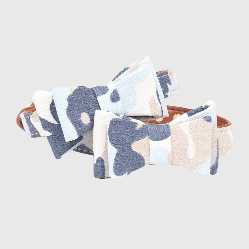 https://cdn.shopify.com/s/files/1/0763/9767/4819/files/Collier_noeud_papillon_chien_couleur_militaire_bleu.png?v=1745415852