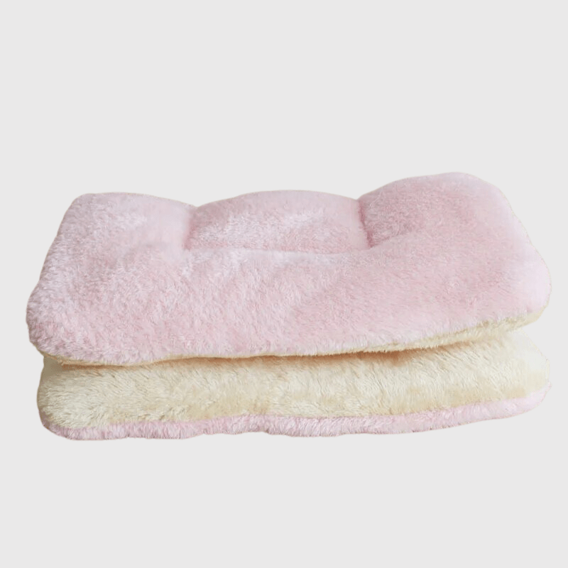 https://cdn.shopify.com/s/files/1/0763/9767/4819/files/Coussin_chien_pour_canape_multicolore_rose_clair.png?v=1748433620