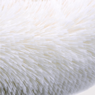 https://cdn.shopify.com/s/files/1/0763/9767/4819/files/Coussin_fluffy_pour_chien_doux.png?v=1747921492