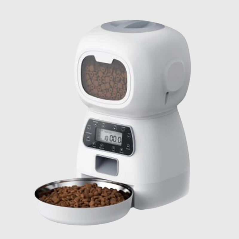 https://cdn.shopify.com/s/files/1/0763/9767/4819/files/Distributeur_de_croquette_pour_chien_modele_blanc.png?v=1691074661