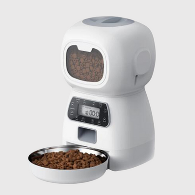 https://cdn.shopify.com/s/files/1/0763/9767/4819/files/Distributeur_de_croquette_pour_chien_modele_blanc.png?v=1691074661