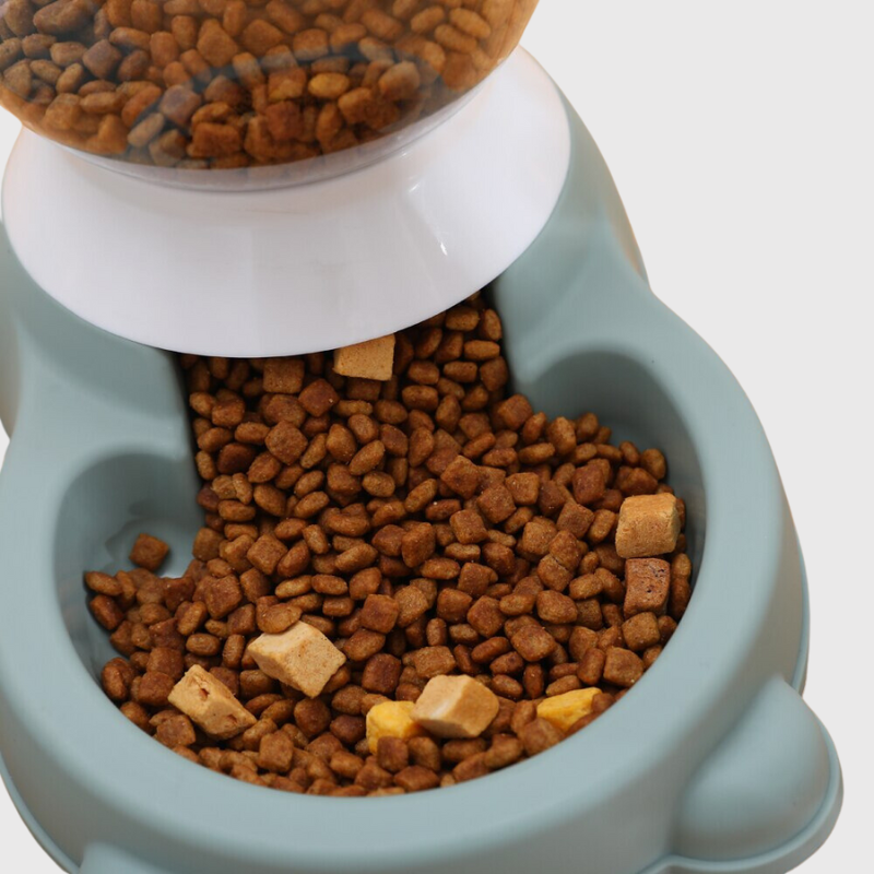 https://cdn.shopify.com/s/files/1/0763/9767/4819/files/Distributeur_de_croquettes_et_d_eau_pour_chien_zoom_sur_la_gamelle.png?v=1691598984