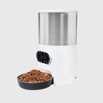 https://cdn.shopify.com/s/files/1/0763/9767/4819/files/Distributeur_de_croquettes_pour_chien_programmable_rond.png?v=1691154248