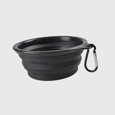 https://cdn.shopify.com/s/files/1/0763/9767/4819/files/Gamelle_chien_pliable_noir.png?v=1744293748