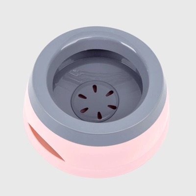 https://cdn.shopify.com/s/files/1/0763/9767/4819/files/Gamelle_eau_chien_anti_eclaboussure_rose_de_haut.png?v=1753283698