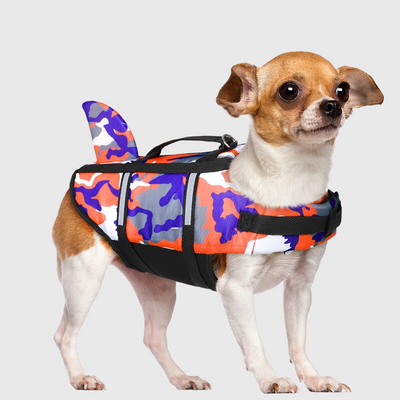 https://cdn.shopify.com/s/files/1/0763/9767/4819/files/Gilet_de_nage_pour_chien_oran_et_bleu_modele_requin.png?v=1753792119