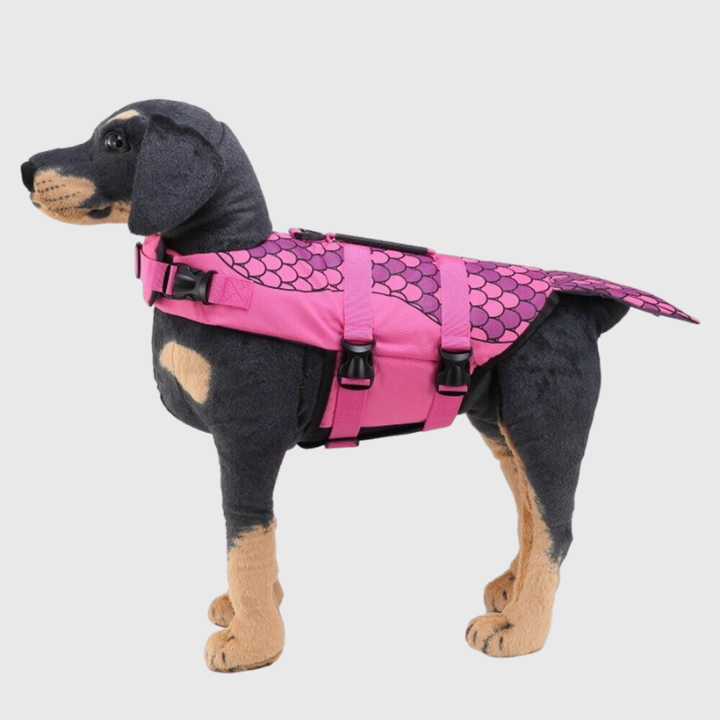 https://cdn.shopify.com/s/files/1/0763/9767/4819/files/Gilet_de_sauvetage_pour_chien_requin_rose_a_motif.png?v=1743778421