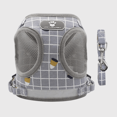 https://cdn.shopify.com/s/files/1/0763/9767/4819/files/Harnais_pour_chien_a_carreaux_gris.png?v=1698685705
