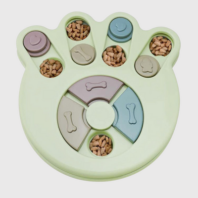 https://cdn.shopify.com/s/files/1/0763/9767/4819/files/Jeu_de_reflexion_forme_de_patte_pour_chien_vert.png?v=1746201961