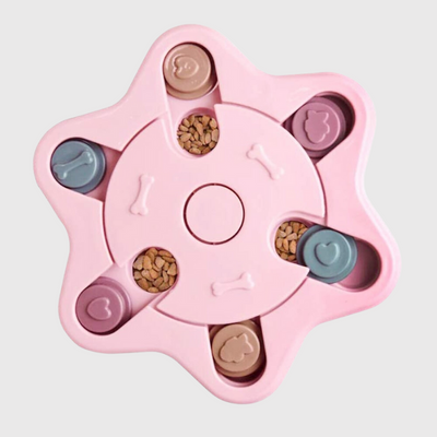 https://cdn.shopify.com/s/files/1/0763/9767/4819/files/Jouet_distributeur_de_croquettes_pour_chien_rose.png?v=1755871890