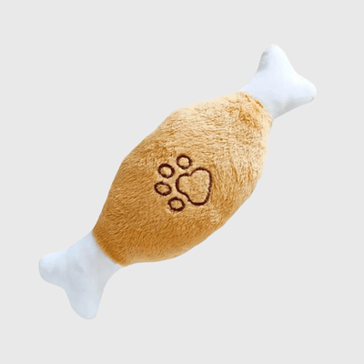 https://cdn.shopify.com/s/files/1/0763/9767/4819/files/Jouet_en_peluche_pour_chien_cuisse_poulet.png?v=1749141183