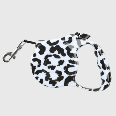 https://cdn.shopify.com/s/files/1/0763/9767/4819/files/Laisse_enrouleur_3M_ou_5M_zebre.png?v=1698851559