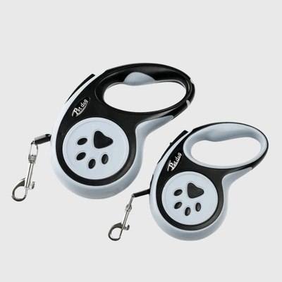 https://cdn.shopify.com/s/files/1/0763/9767/4819/files/Laisse_enrouleur_patte_de_chien.png?v=1698852516