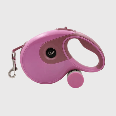 https://cdn.shopify.com/s/files/1/0763/9767/4819/files/Laisse_enrouleur_rose_pour_chien_sac_a_caca.png?v=1698774412