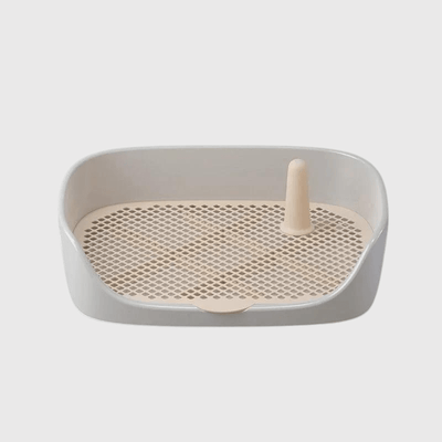 https://cdn.shopify.com/s/files/1/0763/9767/4819/files/Litiere_pour_chien_sur_terrasse_gris.png?v=1748608659