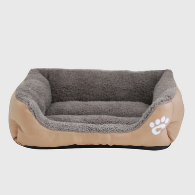https://cdn.shopify.com/s/files/1/0763/9767/4819/files/Panier_confortable_pour_chien_beige.png?v=1756383358