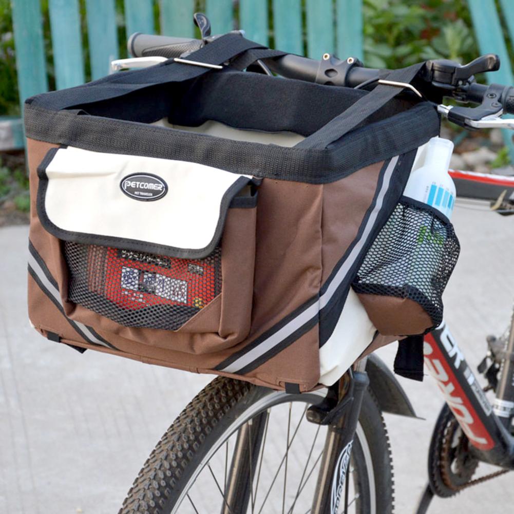 https://cdn.shopify.com/s/files/1/0763/9767/4819/files/Panier_pour_chien_pour_v_lo_devant_du_velo.jpg?v=1748438815
