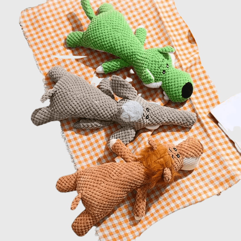 https://cdn.shopify.com/s/files/1/0763/9767/4819/files/Peluche_colore_pour_chien_exemple.png?v=1746197356