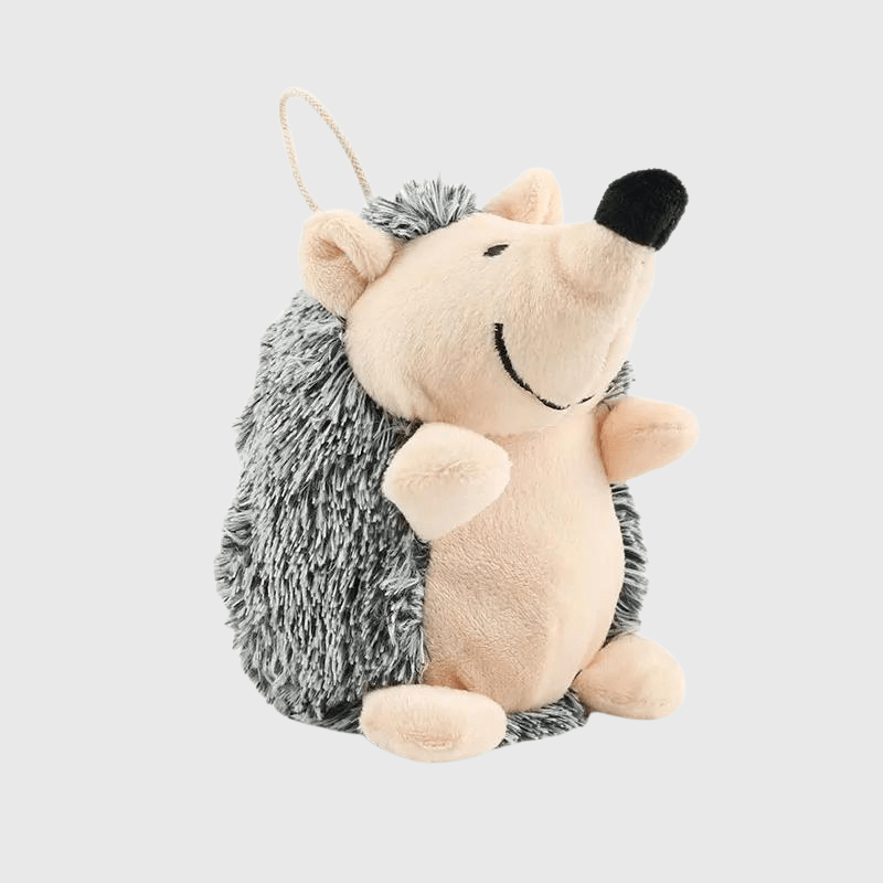 https://cdn.shopify.com/s/files/1/0763/9767/4819/files/Peluche_herisson_pour_chien_beige.png?v=1700153747
