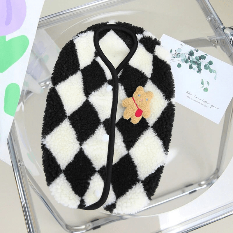 https://cdn.shopify.com/s/files/1/0763/9767/4819/files/Pull_polaire_pour_chien_en_laine_noir_et_blanc.png?v=1756913955