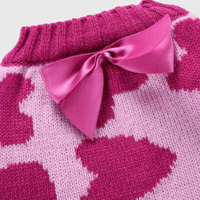 https://cdn.shopify.com/s/files/1/0763/9767/4819/files/Pull_pour_chien_Rose_avec_Coeur_zoom.png?v=1699978221