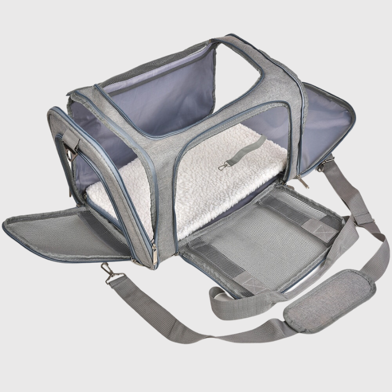 https://cdn.shopify.com/s/files/1/0763/9767/4819/files/Sac_de_transport_en_bandouliere_pour_petit_chien_ouvert.png?v=1748442906