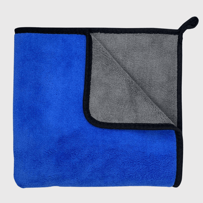 https://cdn.shopify.com/s/files/1/0763/9767/4819/files/Serviette_hyper_absorbante_pour_chien_bleu.png?v=1752158263