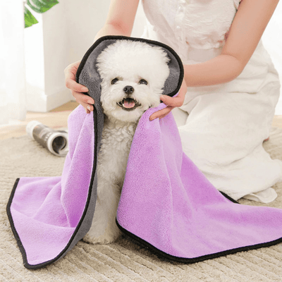 https://cdn.shopify.com/s/files/1/0763/9767/4819/files/Serviette_hyper_absorbante_pour_chien_caniche.png?v=1752158189
