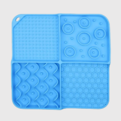 https://cdn.shopify.com/s/files/1/0763/9767/4819/files/Tapis_de_lechage_pour_chien_en_silicone_bleu.png?v=1695661063