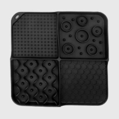 https://cdn.shopify.com/s/files/1/0763/9767/4819/files/Tapis_de_lechage_pour_chien_en_silicone_noir.png?v=1695661063