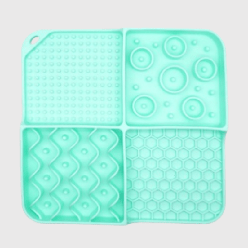 https://cdn.shopify.com/s/files/1/0763/9767/4819/files/Tapis_de_lechage_pour_chien_en_silicone_vert.png?v=1695661063