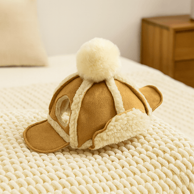 https://cdn.shopify.com/s/files/1/0647/9170/7830/files/bonnet-dhiver-pour-chien-8399596.png?v=1777925593