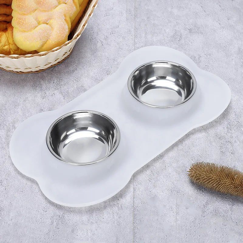 https://cdn.shopify.com/s/files/1/0647/9170/7830/files/doubles-gamelles-anti-derapante-pour-chien-1020442.webp?v=1777925355