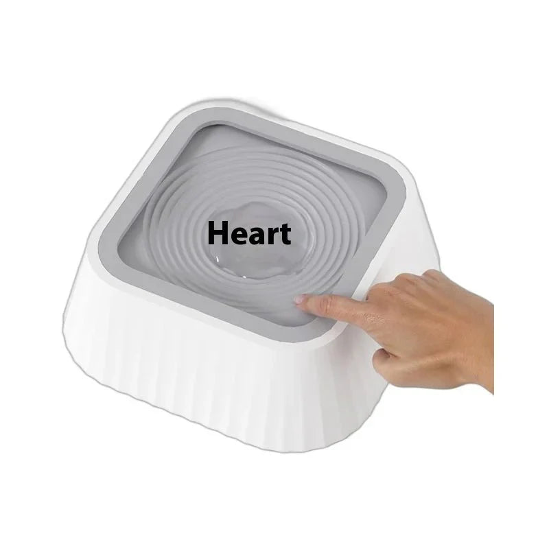 https://cdn.shopify.com/s/files/1/0647/9170/7830/files/gamelle-eau-chien-anti-bave-3765795.webp?v=1777923251