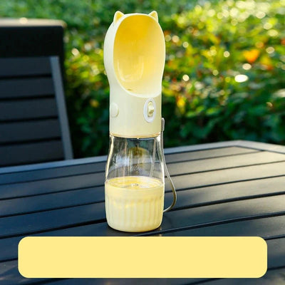 https://cdn.shopify.com/s/files/1/0647/9170/7830/files/gourde-avec-compartiment-friandise-pour-chien-4281664.webp?v=1777924996