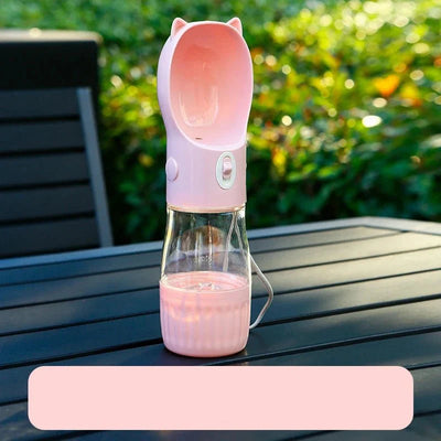 https://cdn.shopify.com/s/files/1/0647/9170/7830/files/gourde-avec-compartiment-friandise-pour-chien-7448832.webp?v=1777924996