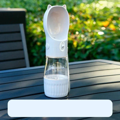 https://cdn.shopify.com/s/files/1/0647/9170/7830/files/gourde-avec-compartiment-friandise-pour-chien-7977001.webp?v=1777924996