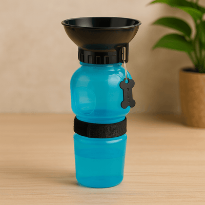 https://cdn.shopify.com/s/files/1/0647/9170/7830/files/gourde-transportable-pour-chien-1818993.png?v=1777924813