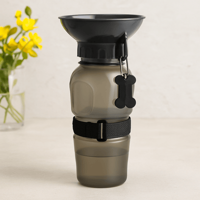 https://cdn.shopify.com/s/files/1/0647/9170/7830/files/gourde-transportable-pour-chien-5202115.png?v=1777924813