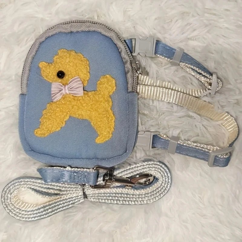 https://cdn.shopify.com/s/files/1/0647/9170/7830/files/harnais-avec-sacoches-pour-tout-petit-chien-1314105.webp?v=1777924696