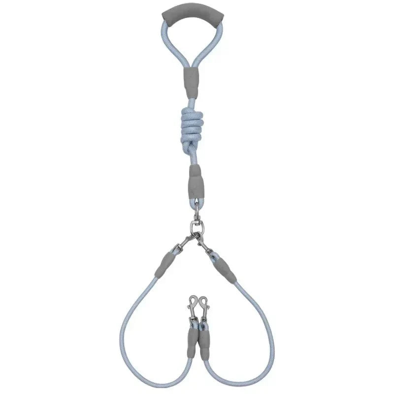 https://cdn.shopify.com/s/files/1/0647/9170/7830/files/laisse-double-pour-chiens-5433157.webp?v=1777924450