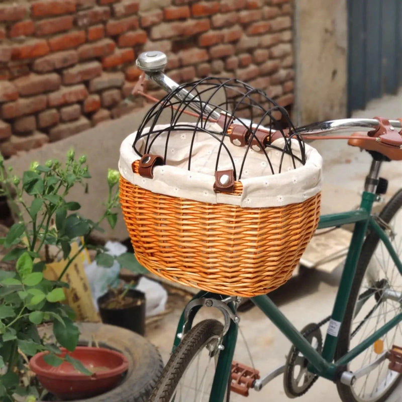 https://cdn.shopify.com/s/files/1/0647/9170/7830/files/panier-de-velo-en-osier-pour-petit-chien-7404972.webp?v=1777924876