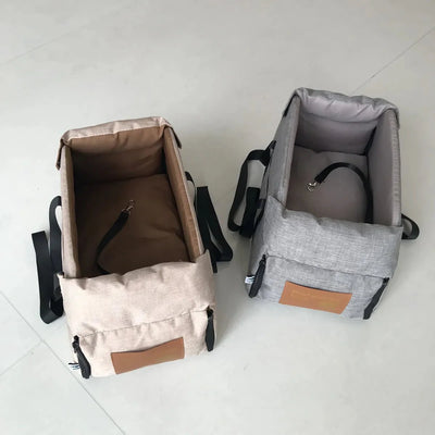 https://cdn.shopify.com/s/files/1/0647/9170/7830/files/panier-de-voyage-chien-pour-accoudoir-3720567.webp?v=1777924934